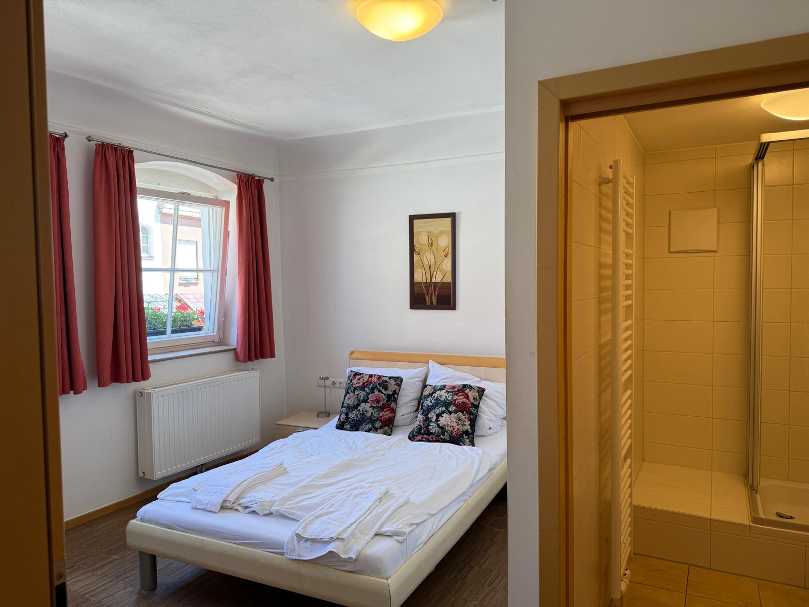 Budget-friendly double room with French double bed at Hotel Stadtblick Friedberg