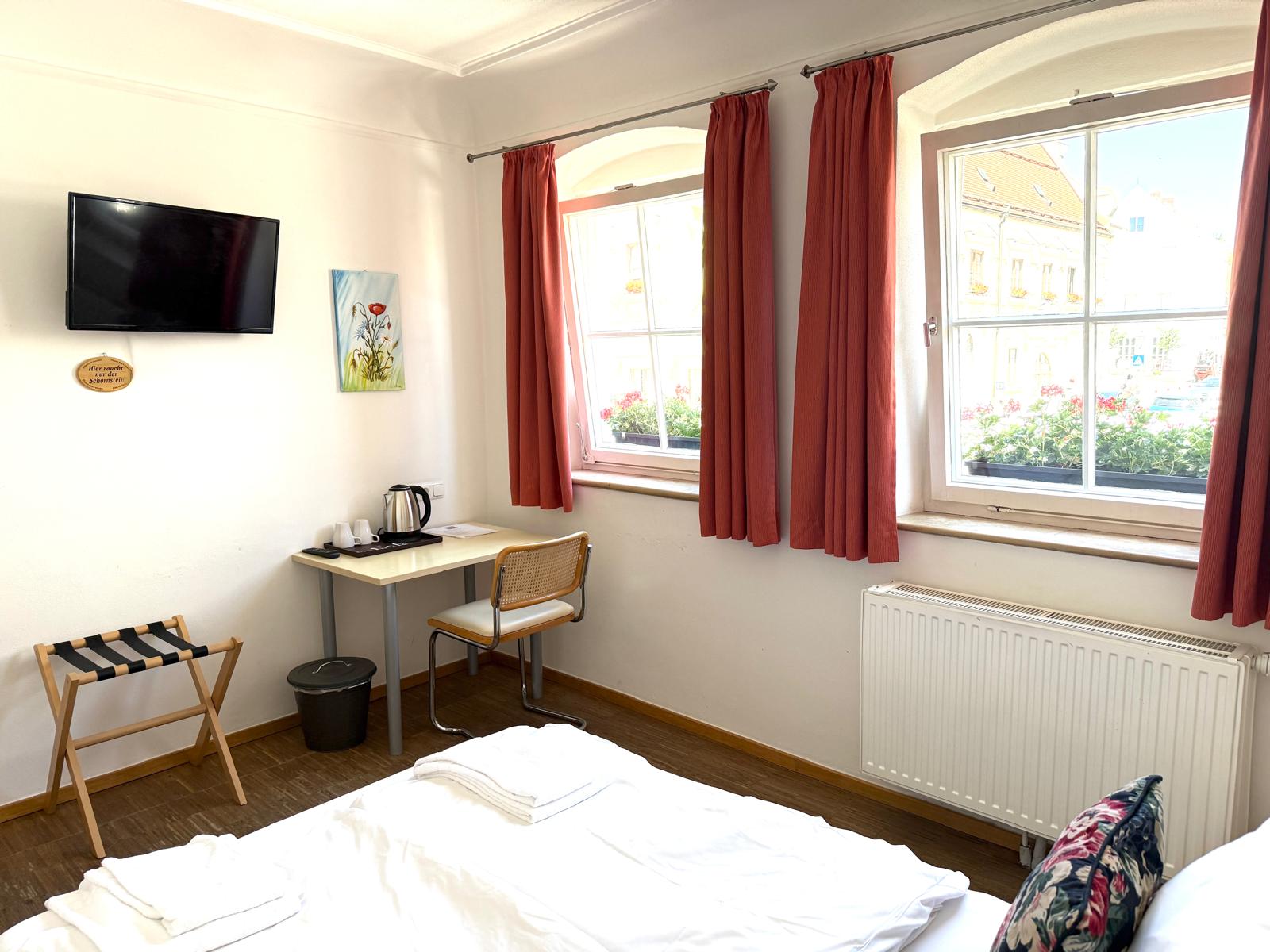 Clean modern bathroom facilities in budget double room at Hotel Stadtblick Friedberg