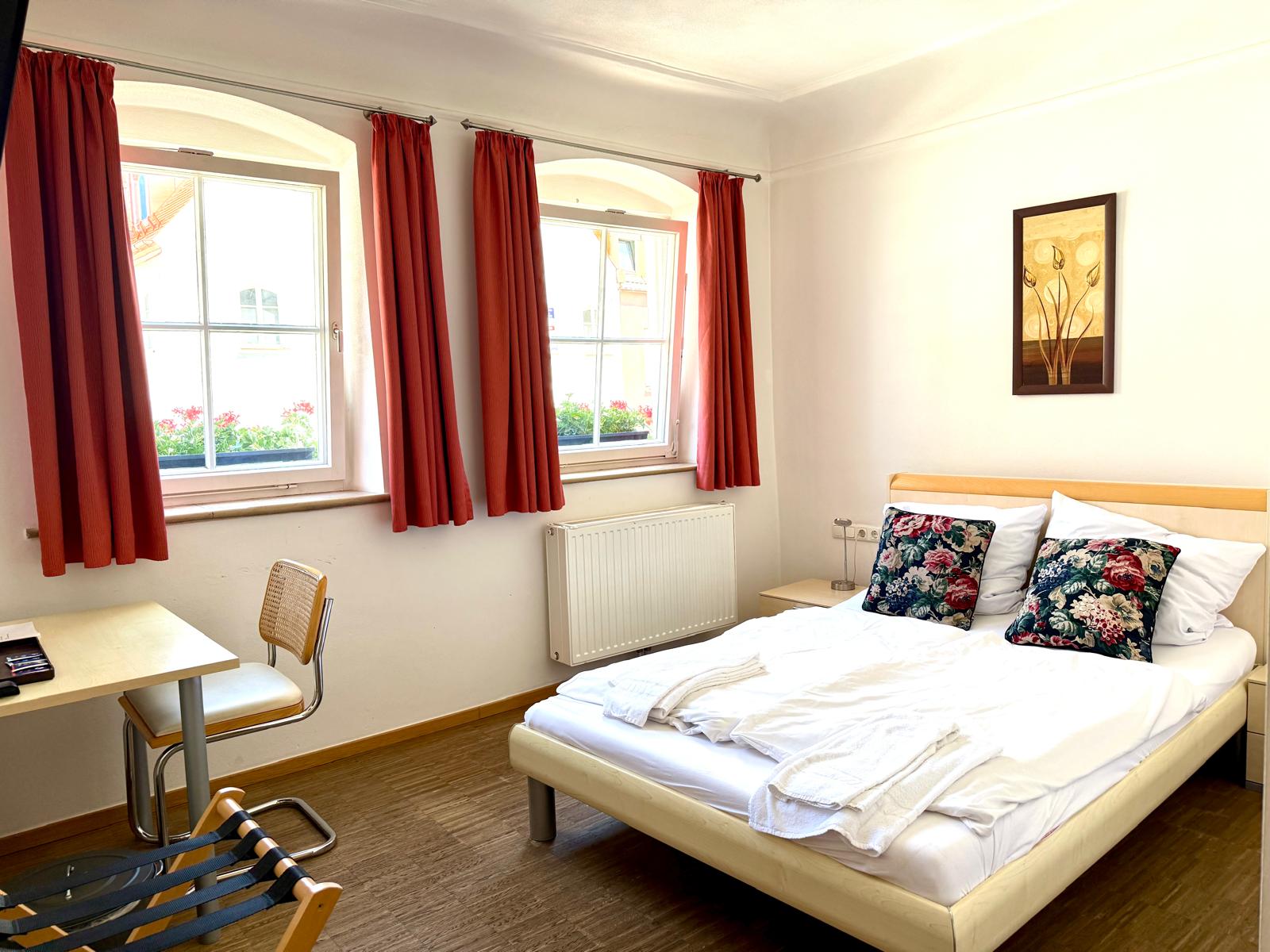 Clean modern bathroom facilities in budget double room at Hotel Stadtblick Friedberg