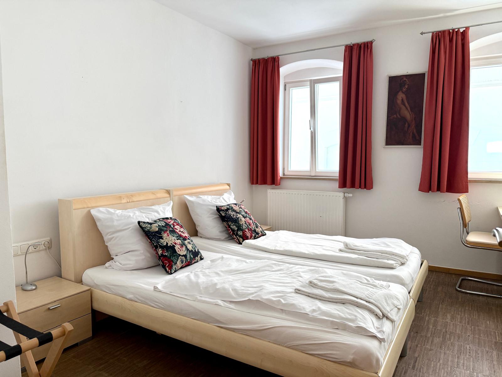 Modern private bathroom with shower facilities in double room at Hotel Stadtblick Friedberg