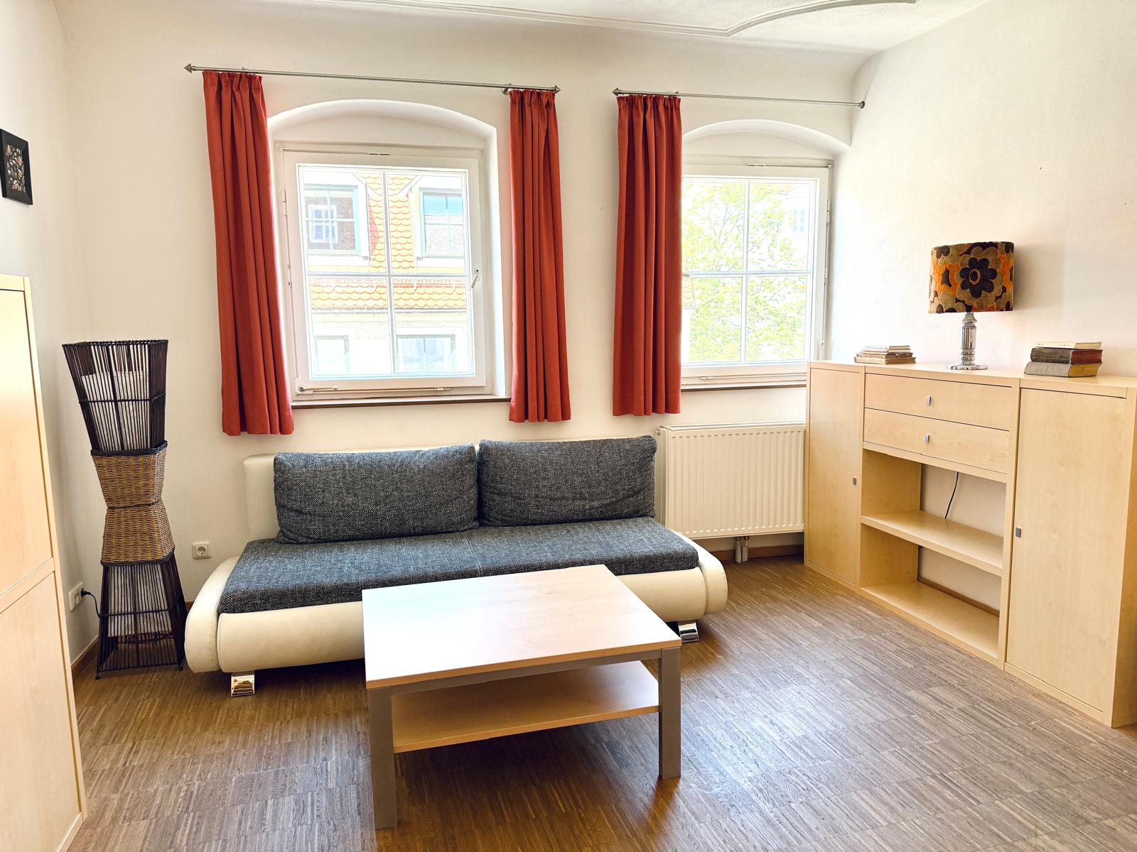 Spacious family suite bedroom with double bed at Hotel Stadtblick Friedberg