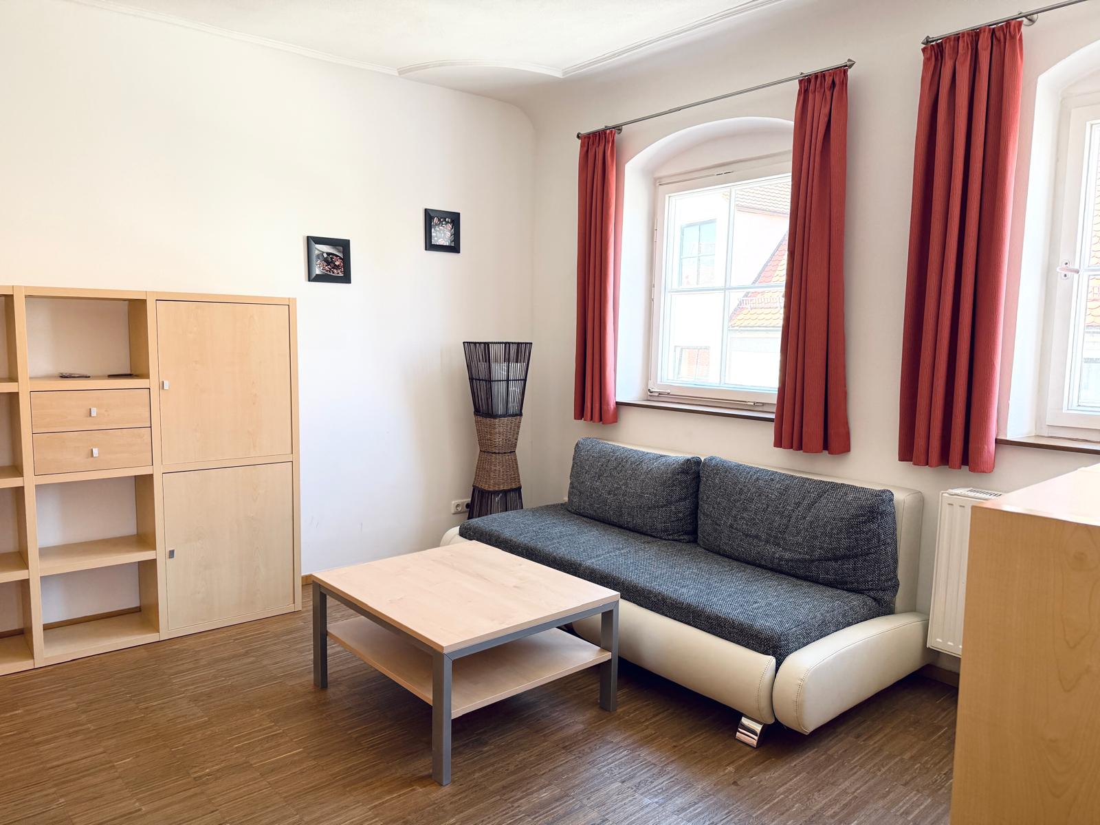 Spacious family suite bedroom with double bed at Hotel Stadtblick Friedberg